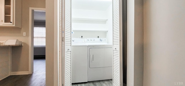 4065 Fort Ave, Lynchburg, VA 24502 - laundry area featuring independent washer and dryer, wood finished floors, and baseboards