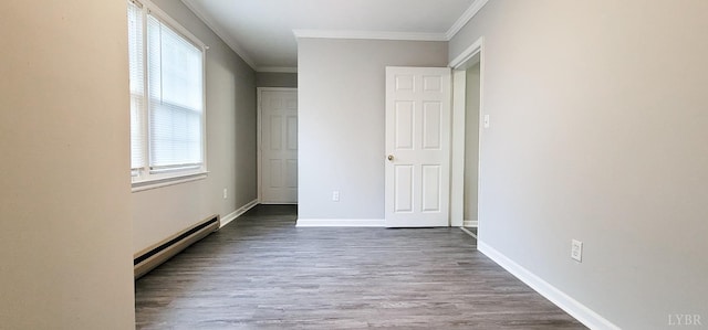4065 Fort Ave, Lynchburg, VA 24502 - unfurnished bedroom with a baseboard heating unit, ornamental molding, dark wood-style flooring, and baseboards