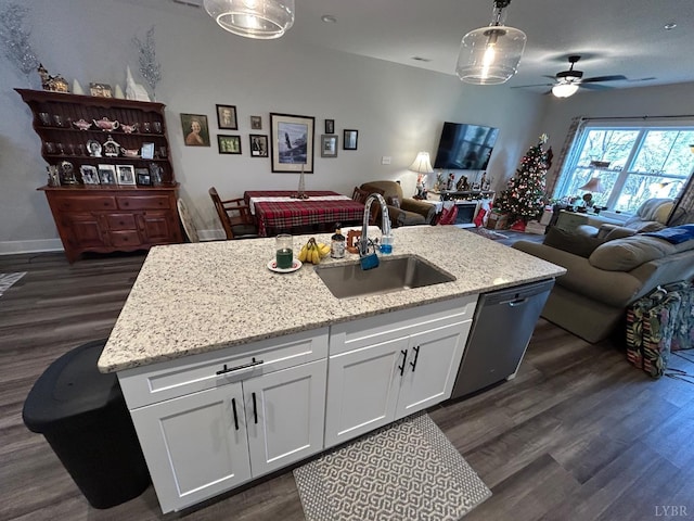 1300 Stoney Ridge Blvd Unit 102, Forest, VA 24551 - kitchen featuring stainless steel dishwasher, a kitchen island with sink, sink, white cabinets, and hanging light fixtures