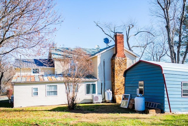 67 Lentz Ln, Shipman, VA 22971 - back of property featuring ac unit, a yard, and a chimney