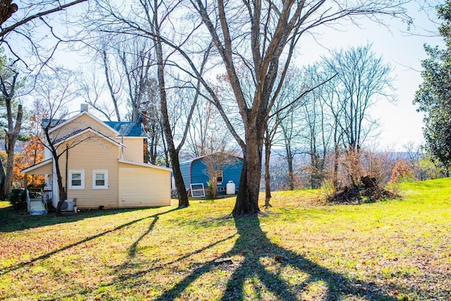 67 Lentz Ln, Shipman, VA 22971 - view of green lawn featuring a carport