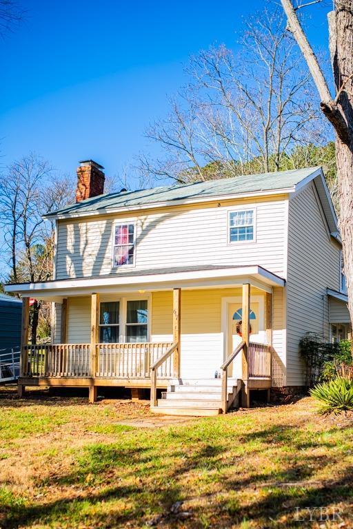 67 Lentz Ln, Shipman, VA 22971 - view of front of home with a chimney, a porch, and a front lawn