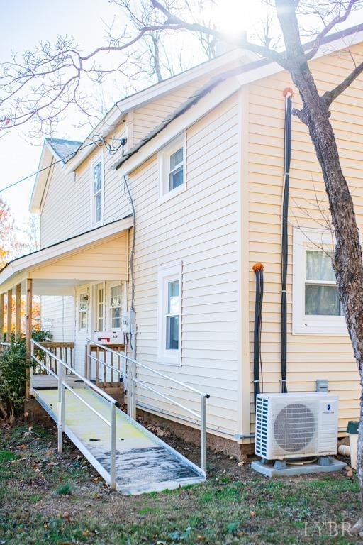 67 Lentz Ln, Shipman, VA 22971 - rear view of property featuring ac unit and covered porch