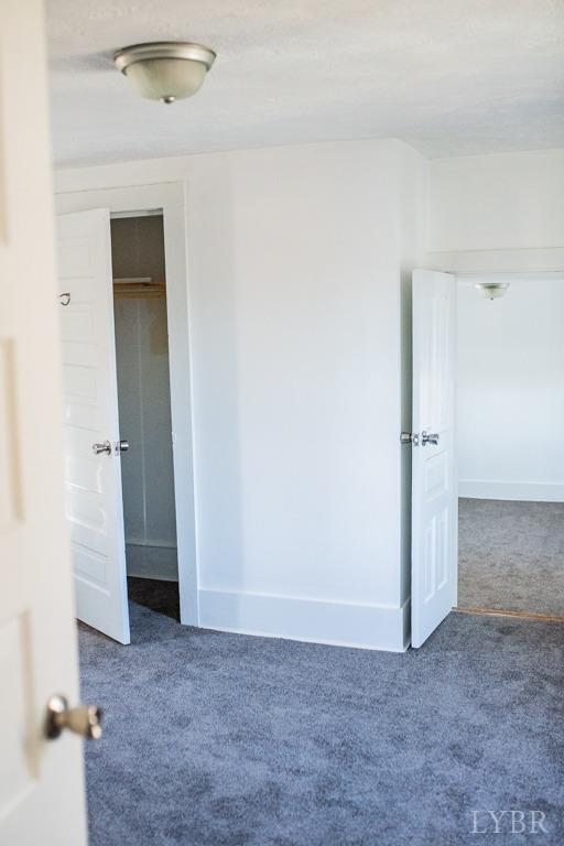 67 Lentz Ln, Shipman, VA 22971 - carpeted spare room featuring baseboards