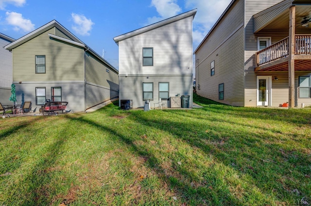 3047 Fulton St, Lynchburg, VA 24501 - rear view of property featuring a yard and ceiling fan