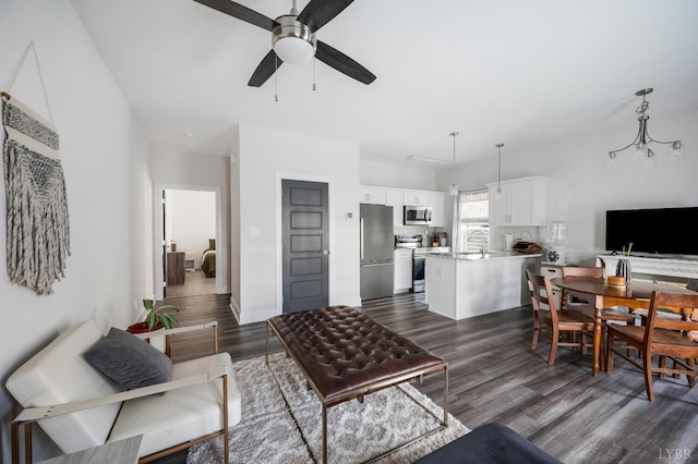 3047 Fulton St, Lynchburg, VA 24501 - living room featuring a ceiling fan and dark wood-style floors