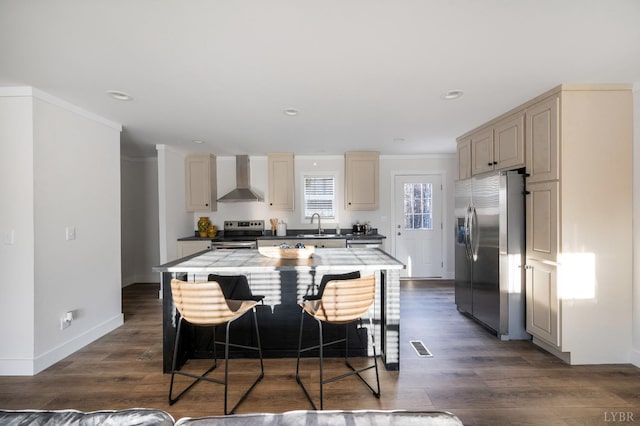 899 Union Hill Rd, Amherst, VA 24521 - kitchen with stainless steel appliances, wall chimney range hood, dark wood-type flooring, a center island, and ornamental molding