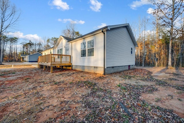 899 Union Hill Rd, Amherst, VA 24521 - back of property with a wooden deck and crawl space