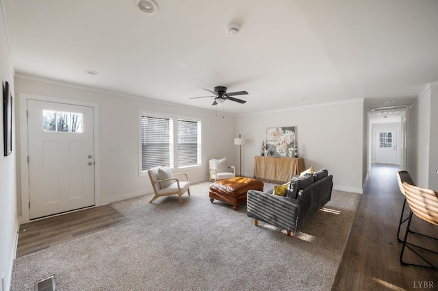 899 Union Hill Rd, Amherst, VA 24521 - carpeted living room with crown molding, a ceiling fan, and wood finished floors