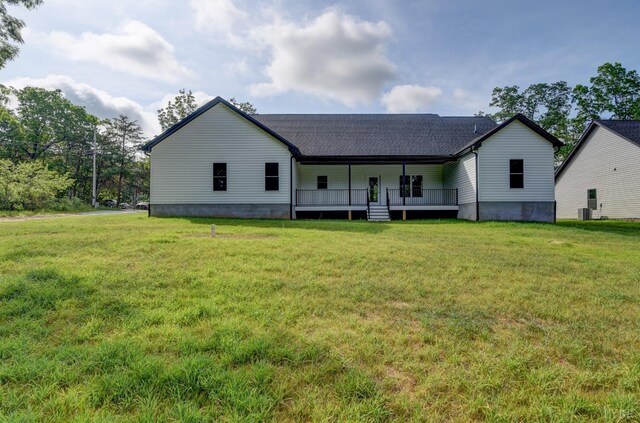 1327 Greenhouse Rd, Rustburg, VA 24588 - back of house featuring a shingled roof, a porch, and a lawn