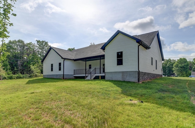 1327 Greenhouse Rd, Rustburg, VA 24588 - rear view of house featuring a lawn and a shingled roof