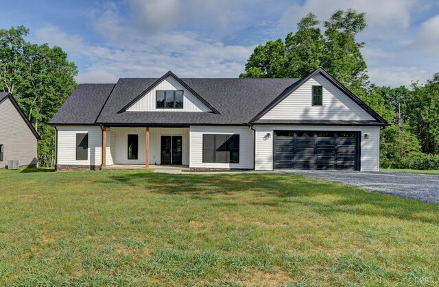 1327 Greenhouse Rd, Rustburg, VA 24588 - modern farmhouse style home with a garage, gravel driveway, central AC unit, roof with shingles, and a front lawn