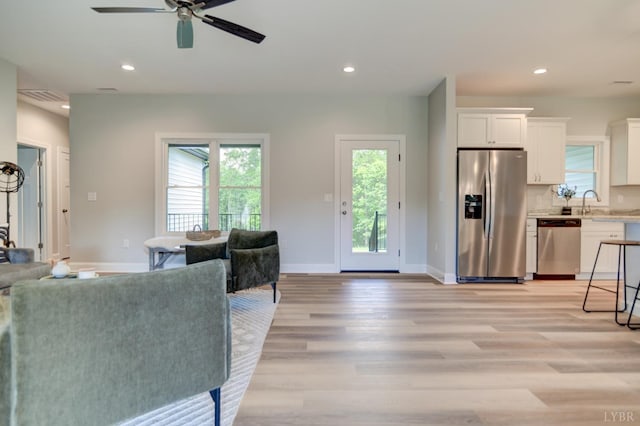 1327 Greenhouse Rd, Rustburg, VA 24588 - living room featuring light wood-style floors, a ceiling fan, and recessed lighting