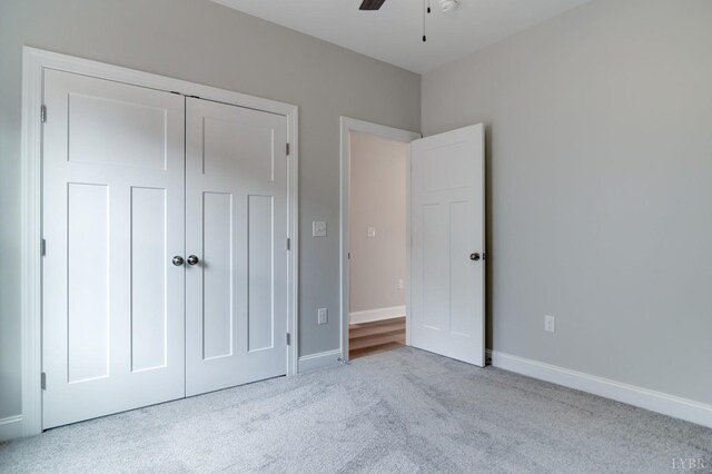 1327 Greenhouse Rd, Rustburg, VA 24588 - unfurnished bedroom with carpet, a closet, baseboards, and a ceiling fan