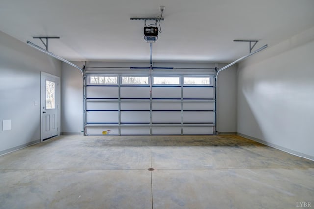 1327 Greenhouse Rd, Rustburg, VA 24588 - garage featuring baseboards and a garage door opener