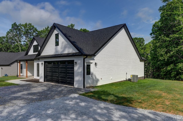 1327 Greenhouse Rd, Rustburg, VA 24588 - view of property exterior featuring aphalt driveway, an attached garage, a yard, central AC unit, and a shingled roof