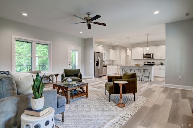 1327 Greenhouse Rd, Rustburg, VA 24588 - living room featuring light wood-type flooring, baseboards, a ceiling fan, and recessed lighting