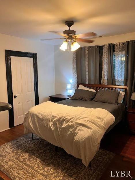 1014 Buchanan St, Lynchburg, VA 24501 - bedroom with dark wood finished floors and a ceiling fan