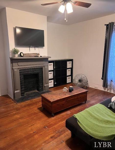 1014 Buchanan St, Lynchburg, VA 24501 - living room with hardwood / wood-style floors, a ceiling fan, and a fireplace