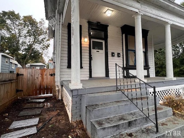 1014 Buchanan St, Lynchburg, VA 24501 - doorway to property with covered porch and fence