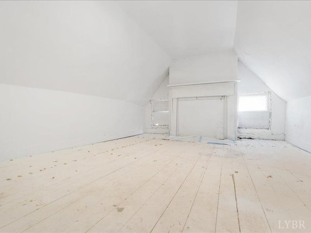 522 Jackson St, Lynchburg, VA 24504 - additional living space with wood-type flooring and vaulted ceiling