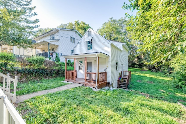 1930 Vine St, Lynchburg, VA 24501 - rear view of property featuring a lawn and a porch