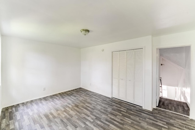 1930 Vine St, Lynchburg, VA 24501 - unfurnished bedroom featuring baseboards, wood finished floors, and a closet