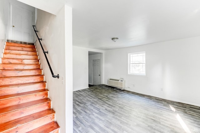1930 Vine St, Lynchburg, VA 24501 - stairway featuring an AC wall unit and wood finished floors