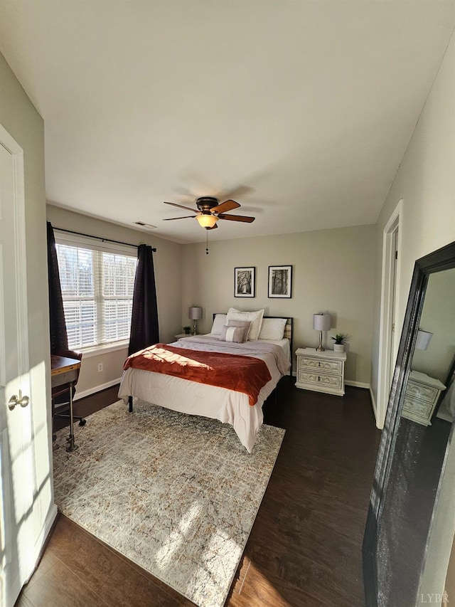 1810 Broadway St Unit 102, Lynchburg, VA 24501 - bedroom with baseboards, a ceiling fan, wood finished floors, and visible vents