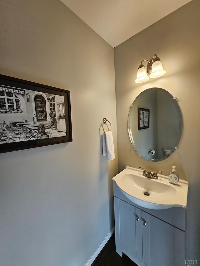 1810 Broadway St Unit 102, Lynchburg, VA 24501 - bathroom featuring baseboards, vanity, and wood finished floors