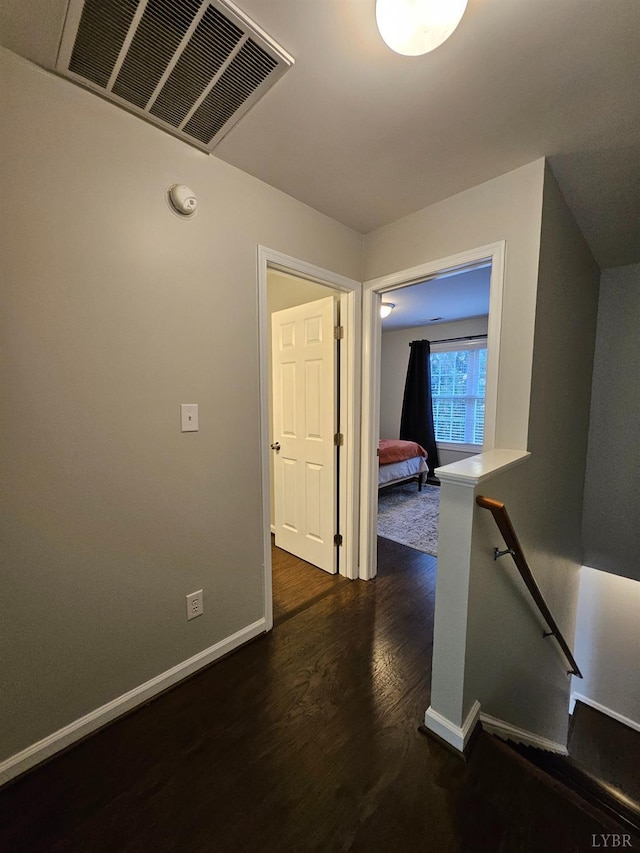 1810 Broadway St Unit 102, Lynchburg, VA 24501 - hallway featuring baseboards, visible vents, an upstairs landing, and dark wood-style flooring