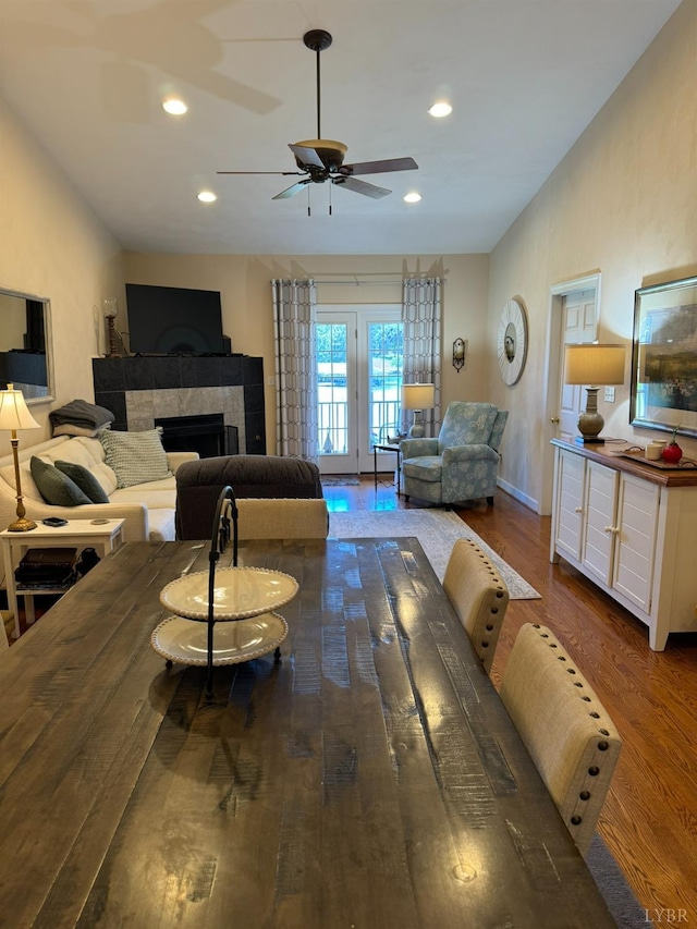 206 Blarney Stone Ct, Huddleston, VA 24104 - living area with a ceiling fan, wood finished floors, baseboards, a fireplace, and recessed lighting