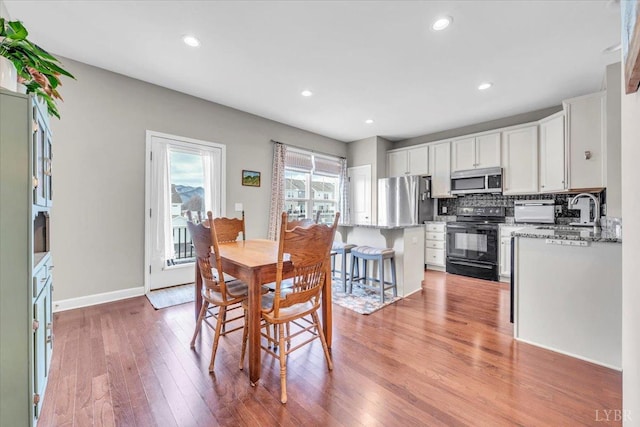 59 Broad St, Daleville, VA 24083 - dining room with recessed lighting, baseboards, and light wood-style flooring