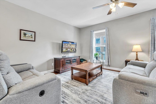 59 Broad St, Daleville, VA 24083 - living area featuring baseboards, ceiling fan, and light wood-style flooring