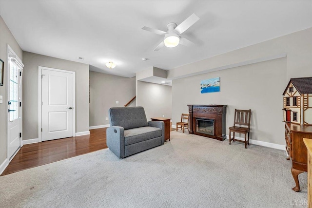 59 Broad St, Daleville, VA 24083 - living area with carpet floors, a ceiling fan, baseboards, and stairway