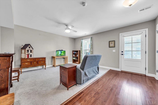 59 Broad St, Daleville, VA 24083 - interior space featuring visible vents, a ceiling fan, baseboards, and wood-type flooring