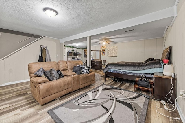 1117 Long Meadows Dr, Lynchburg, VA 24502 - bedroom featuring wood finished floors, a decorative wall, and a textured ceiling