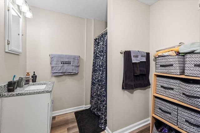 1117 Long Meadows Dr, Lynchburg, VA 24502 - full bath with wood finished floors, baseboards, vanity, and curtained shower