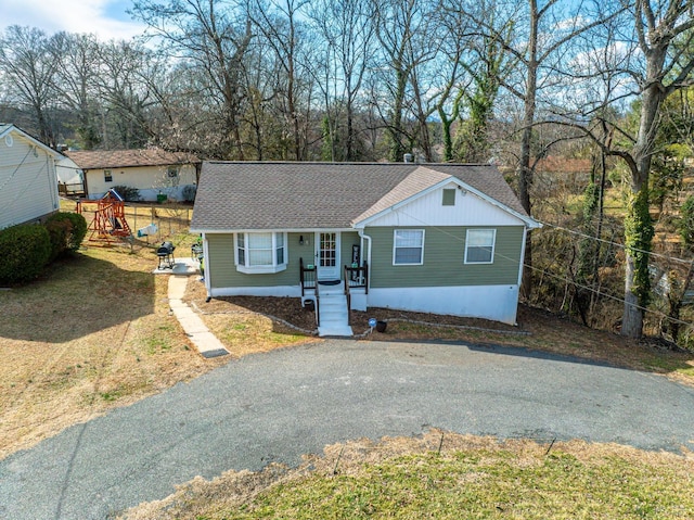 1117 Long Meadows Dr, Lynchburg, VA 24502 - view of front facade featuring roof with shingles and a playground