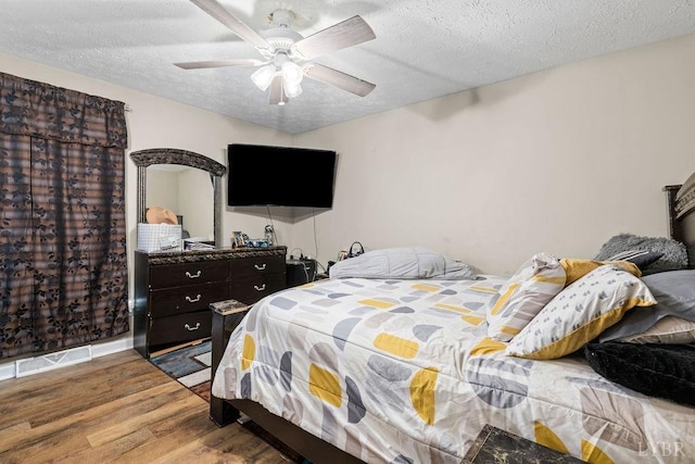 1117 Long Meadows Dr, Lynchburg, VA 24502 - bedroom featuring wood finished floors, a textured ceiling, and ceiling fan