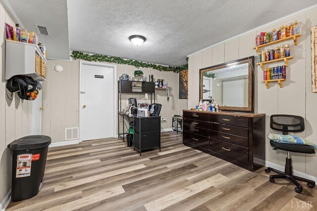 1117 Long Meadows Dr, Lynchburg, VA 24502 - home office featuring light wood-type flooring, baseboards, and a textured ceiling