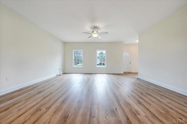 7 Lochwood Hill Dr, Goode, VA 24556 - unfurnished room with a ceiling fan, baseboards, and wood finished floors