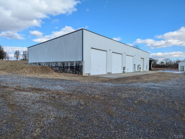 view of outdoor structure with a garage