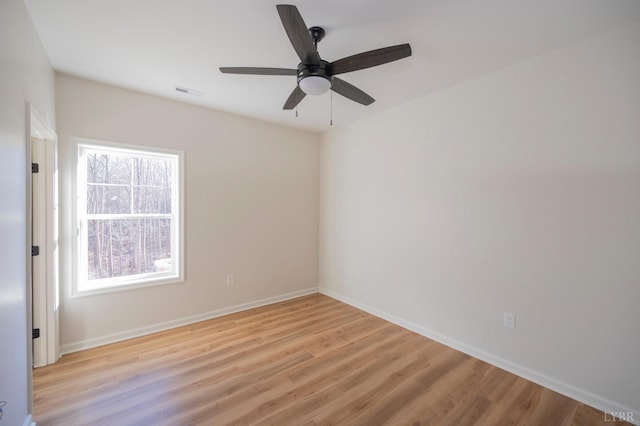 128 Brenleigh Ct Unit 202, Lynchburg, VA 24501 - spare room featuring light wood-style floors, baseboards, and ceiling fan