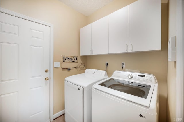 152 Fairwinds Ct, Forest, VA 24551 - laundry area with cabinet space, washing machine and dryer, and a textured ceiling