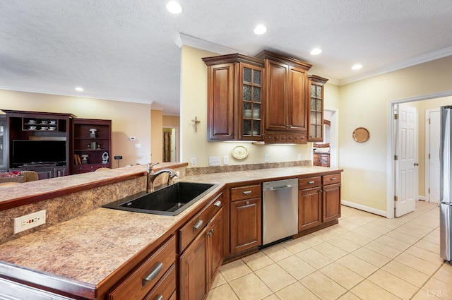 152 Fairwinds Ct, Forest, VA 24551 - kitchen with appliances with stainless steel finishes, a sink, light countertops, glass insert cabinets, and crown molding