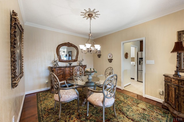 152 Fairwinds Ct, Forest, VA 24551 - dining room featuring wood finished floors, a chandelier, ornamental molding, and baseboards