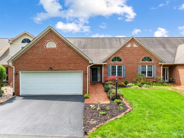 152 Fairwinds Ct, Forest, VA 24551 - traditional home with driveway, brick siding, a garage, and a front yard