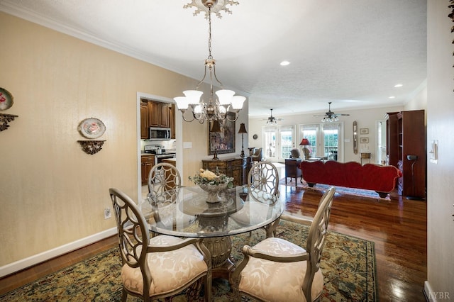 152 Fairwinds Ct, Forest, VA 24551 - dining room featuring ceiling fan, dark wood-style floors, a chandelier, ornamental molding, and baseboards