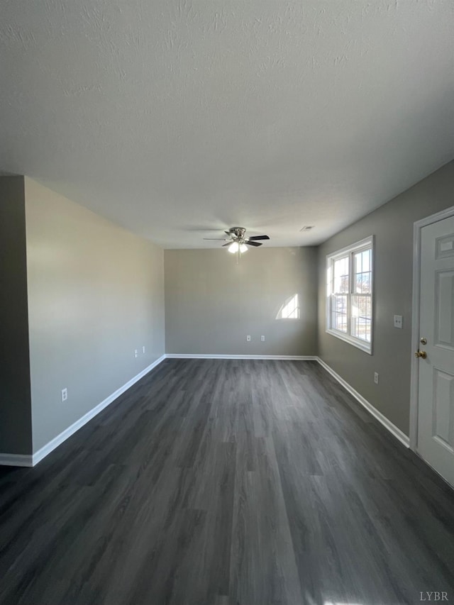 2001 3rd St, Lynchburg, VA 24501 - unfurnished room featuring a ceiling fan, a textured ceiling, baseboards, and dark wood finished floors